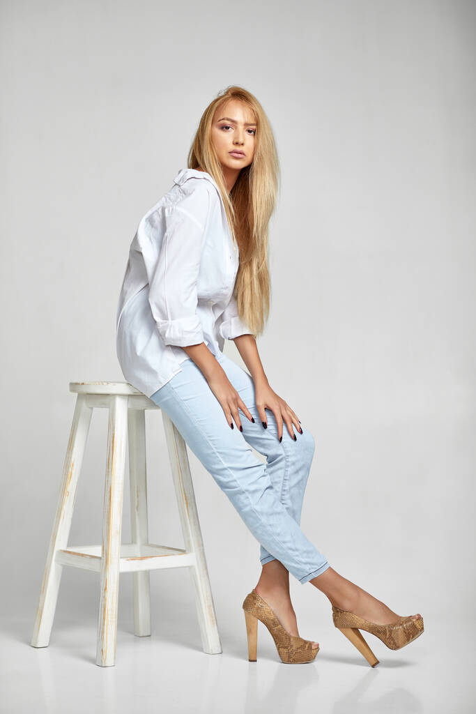 Woman with Light Blue Jeans